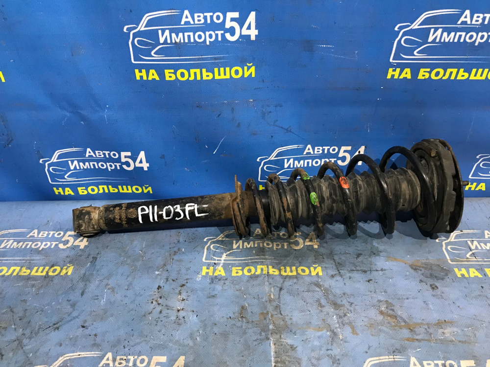 Стойка передняя левая NISSAN PRIMERA 1999