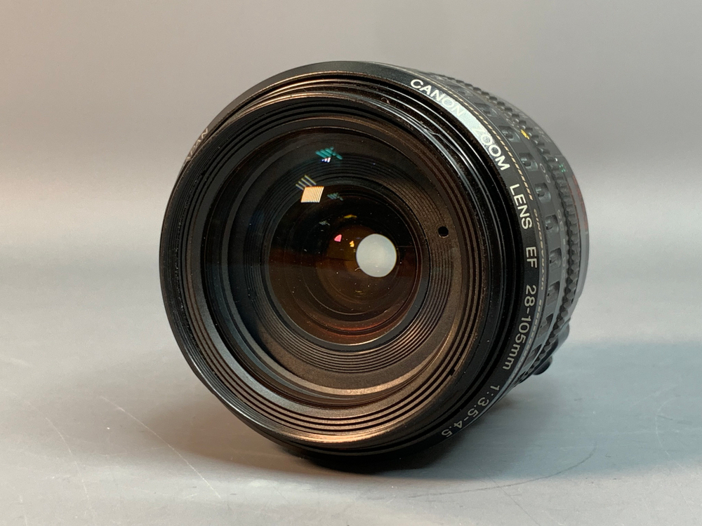 Canon EF 28-105mm 3.5-4.5 II USM скол на задней линзе