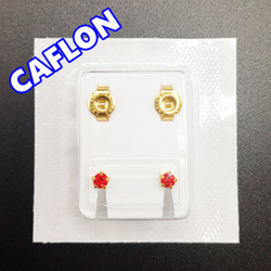 Серьги-гвоздики для прокола ушей под пистолет. CAFLON (Англия). Золотистые с красными ( Июль) кристаллами, крапление