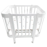 Кровать детская Indigo Italiano Baby продольный маятник на колесах белый-белый