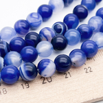 Агат тонированный бусины, цвет темно-синий, диаметр около 8,1-8,3 мм, цена за 22-23 шт (1/2 нити)