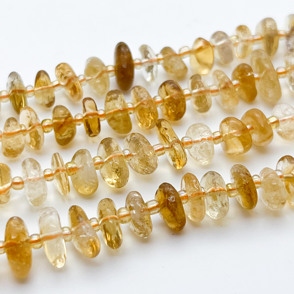 "Цитрин", галтовка, размер около 8-11,5*4,5-4,5 мм, цена за отрезок 19 см (1/2 нити)
