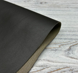 фактура натуральной кожи темно-зеленого цвета