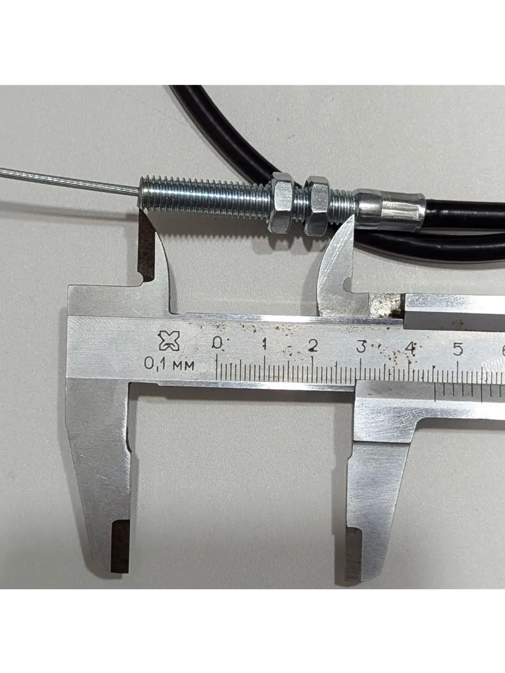 +t Трос сцепления 1000мм (с пружиной)