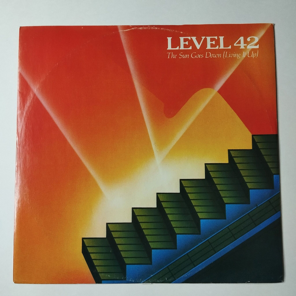 Винтажная виниловая пластинка LP Level 42 The Sun Goes Down (Living It Up) (UK 1983) 45 RPM Maxi Single