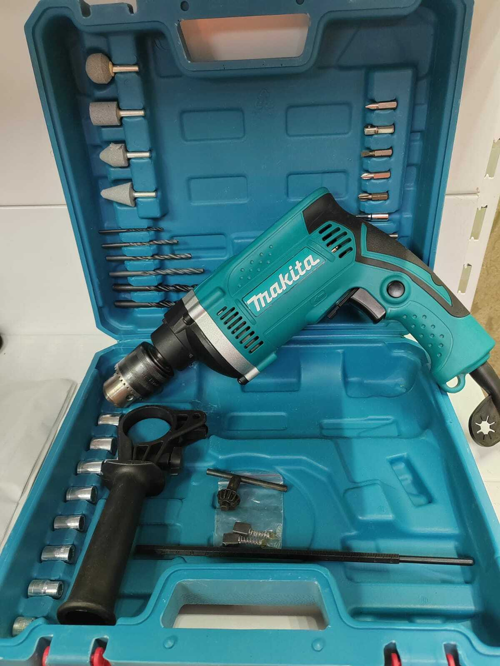 Дрель Makita HP1630