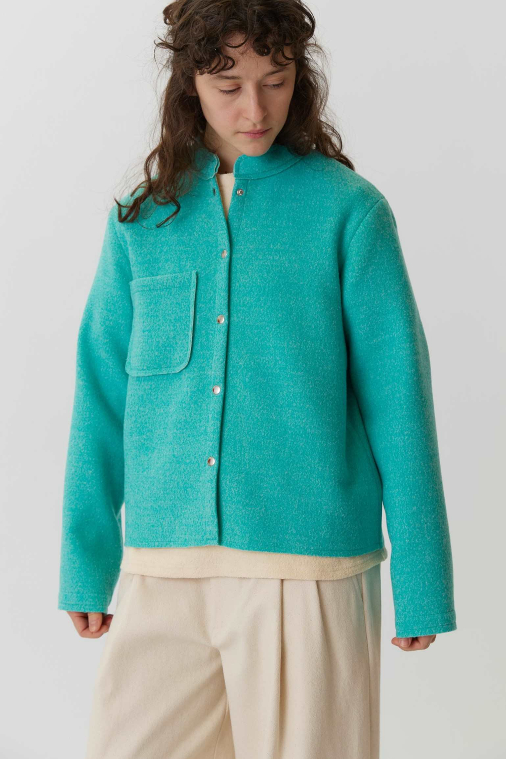 Жакет с карманом бирюзового цвета