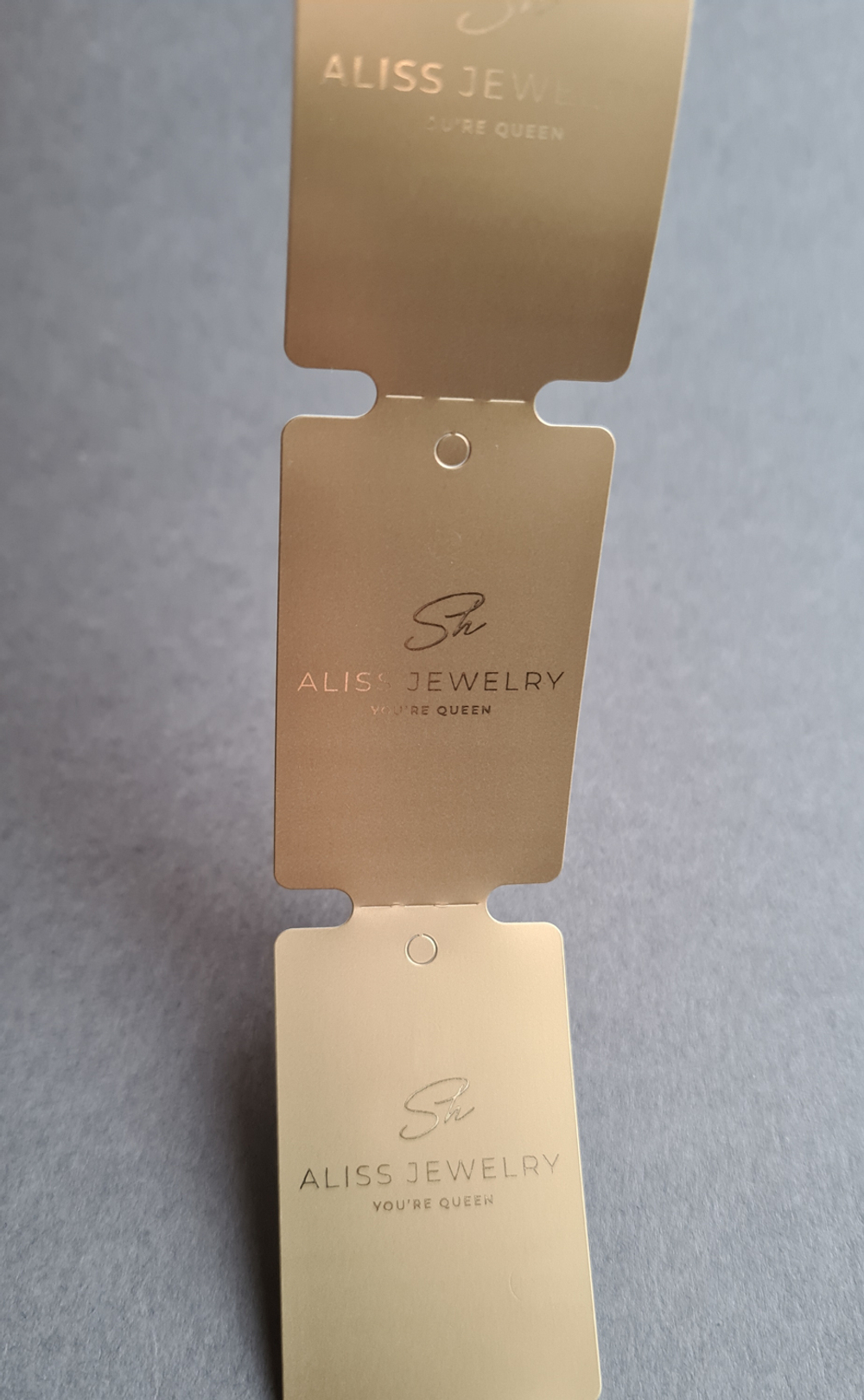 Печать золотой фольгой на золотых бирках