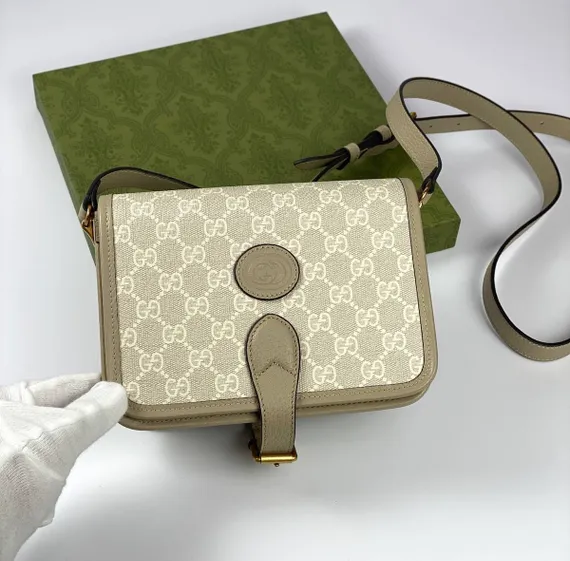 Миниатюрная сумка через плечо Gucci Interlocking G