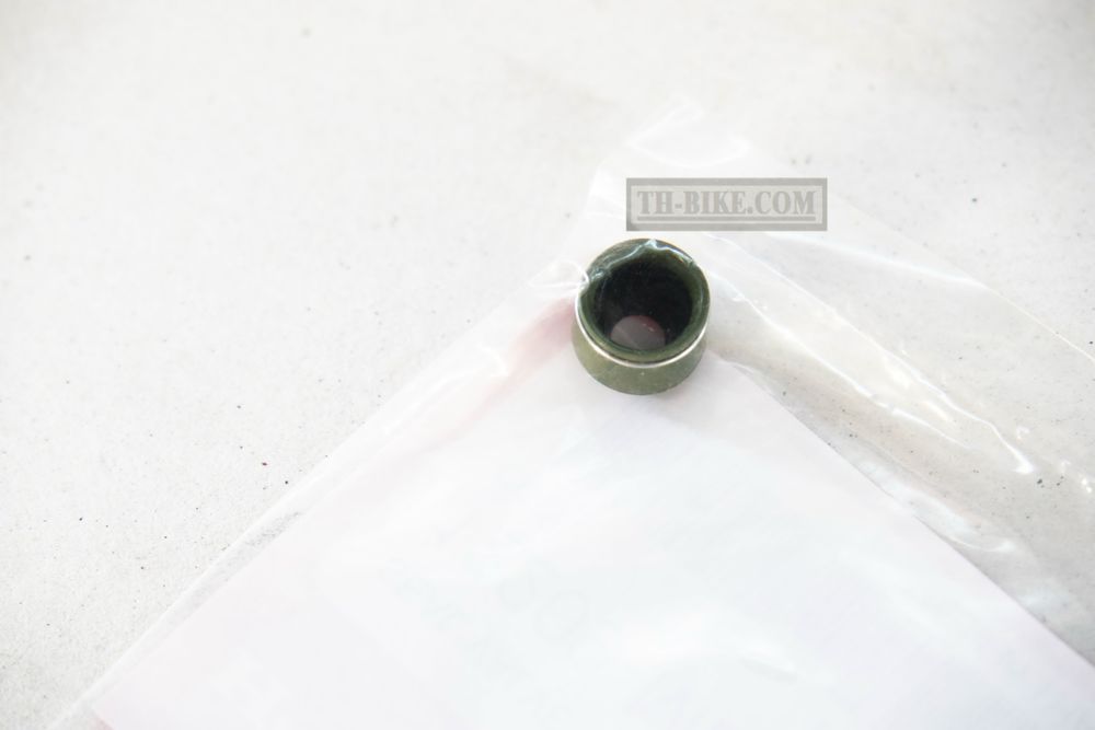 12209-ML0-722. SEAL, VALVE STEM (ARAI)