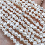 Жемчуг 2А речной бусины 4-5 мм, на нитке 38 см