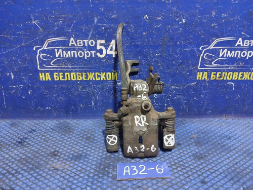 Суппорт тормозной задний правый NISSAN CEFIRO 1994