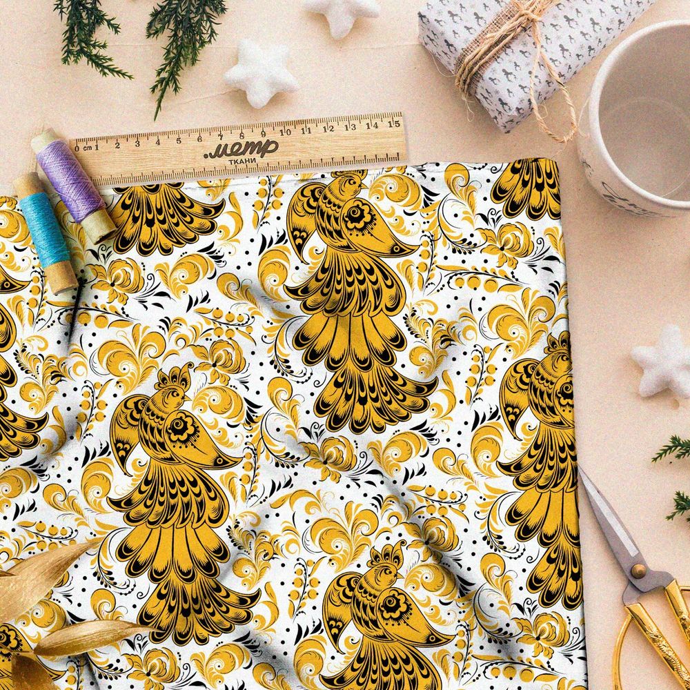 Ткань интерлок хохлома из золотых жар-птиц на белом фоне