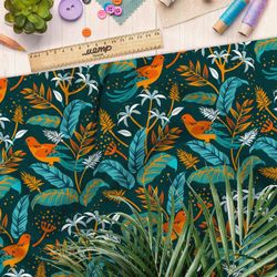 Ткань оксфорд 600 синие листья с оранжевыми птицами