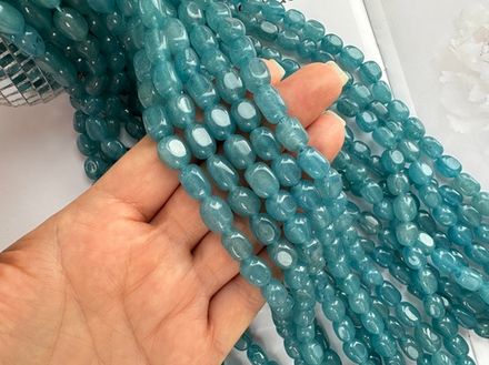 Нить бусин из тонированного кварца 7-8мм (галтовка)