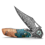 Складной туристический нож TRIVISA Apus-07C/P клинок 67 Layers Damascus рукоять сталь, дерево и смола (бирюзовый-коричневый)