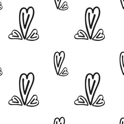 Черные сердечки в узоре на белом фоне.