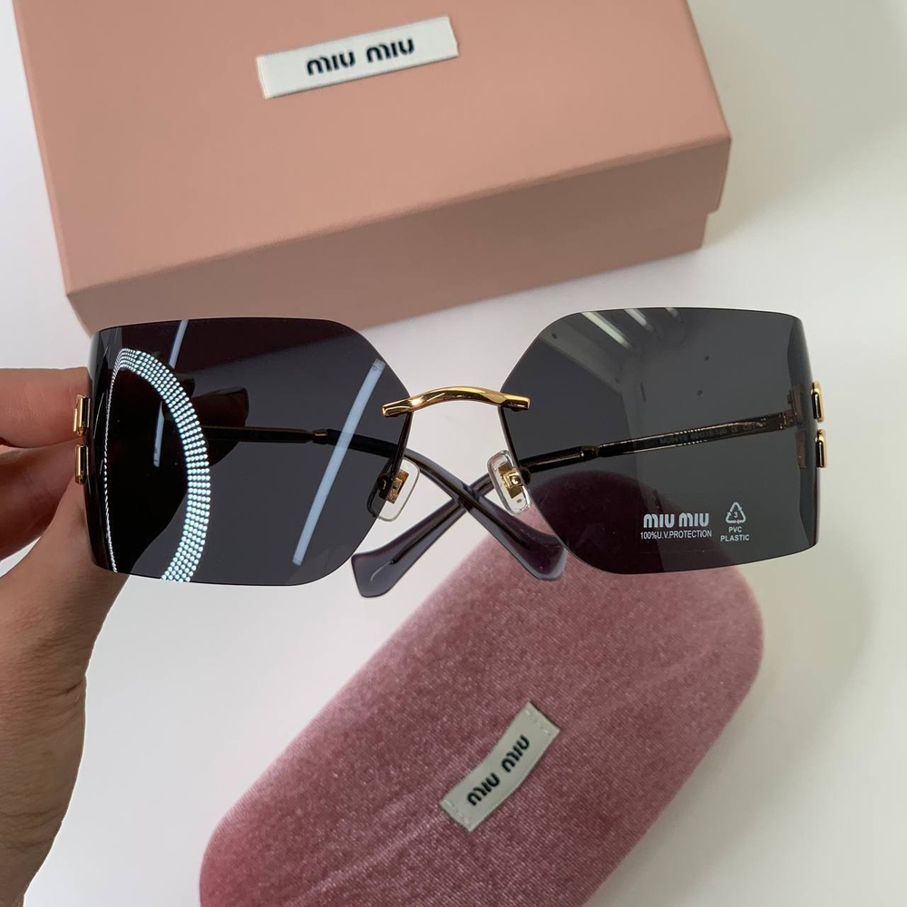 Солнцезащитные очки MIU MIU