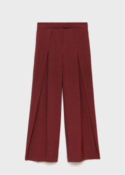 Костюмные брюки с широкими штанинами и защипами