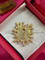 Брошь Schiaparelli