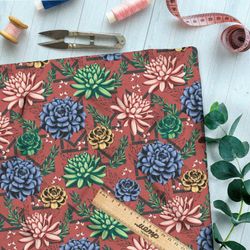 Ткань ниагара приглушённые георгины на коралловом фоне