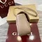 Стеганая мини-сумка Gucci GG Marmont бежевый