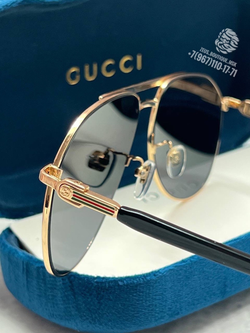 Солнцезащитные очки Gucci