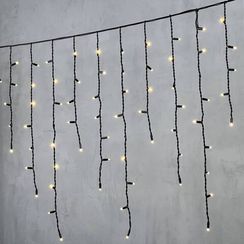 Светодиодная бахрома с колпачком 3,2*0,9 м., 168 теплых белых LED ламп, каучуковый черный провод, LTC (LL168-1-2WW)