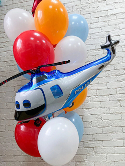 Композиция из воздушных шаров "Космонавт с вертолетом"