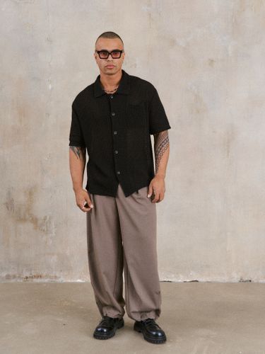 Черная вязаная рубашка ROLF с коротким рукавом