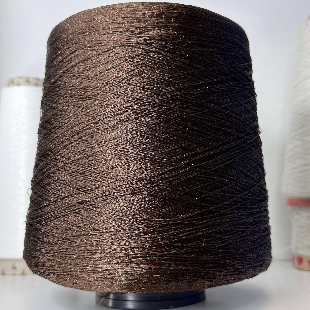 ASTRO - ILARIA CALENZANO; 80% вискоза, 20% люрекс; 1250м/100гр; col. 04212 цвет: темно-коричневая нить с бронзовым люрексом