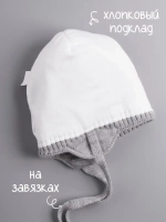 Шапка для девочки на завязках на осень