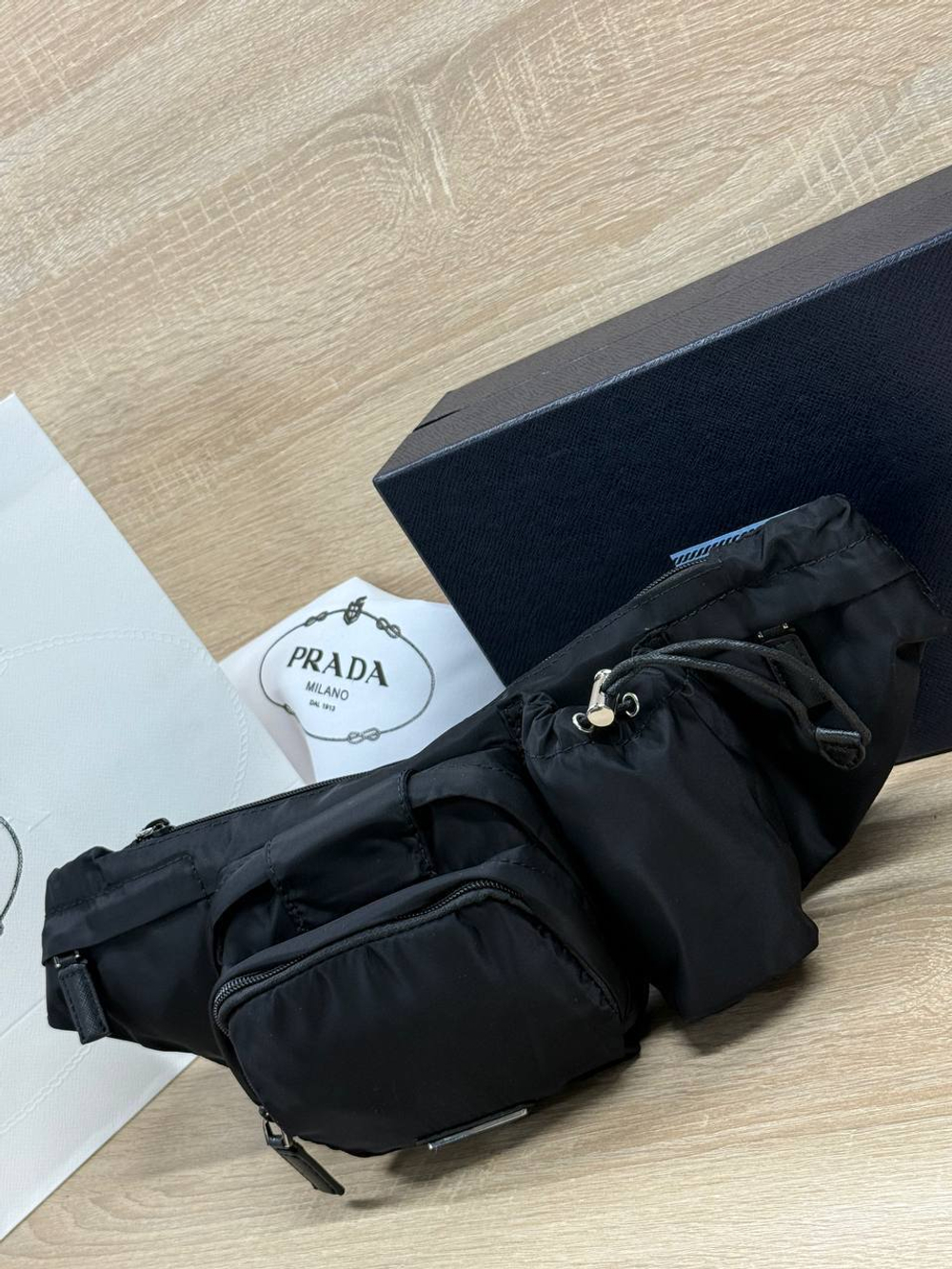 Поясная сумка Prada