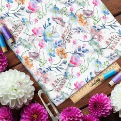 Ткань кулирная гладь пастельные цветы на бежевом фоне