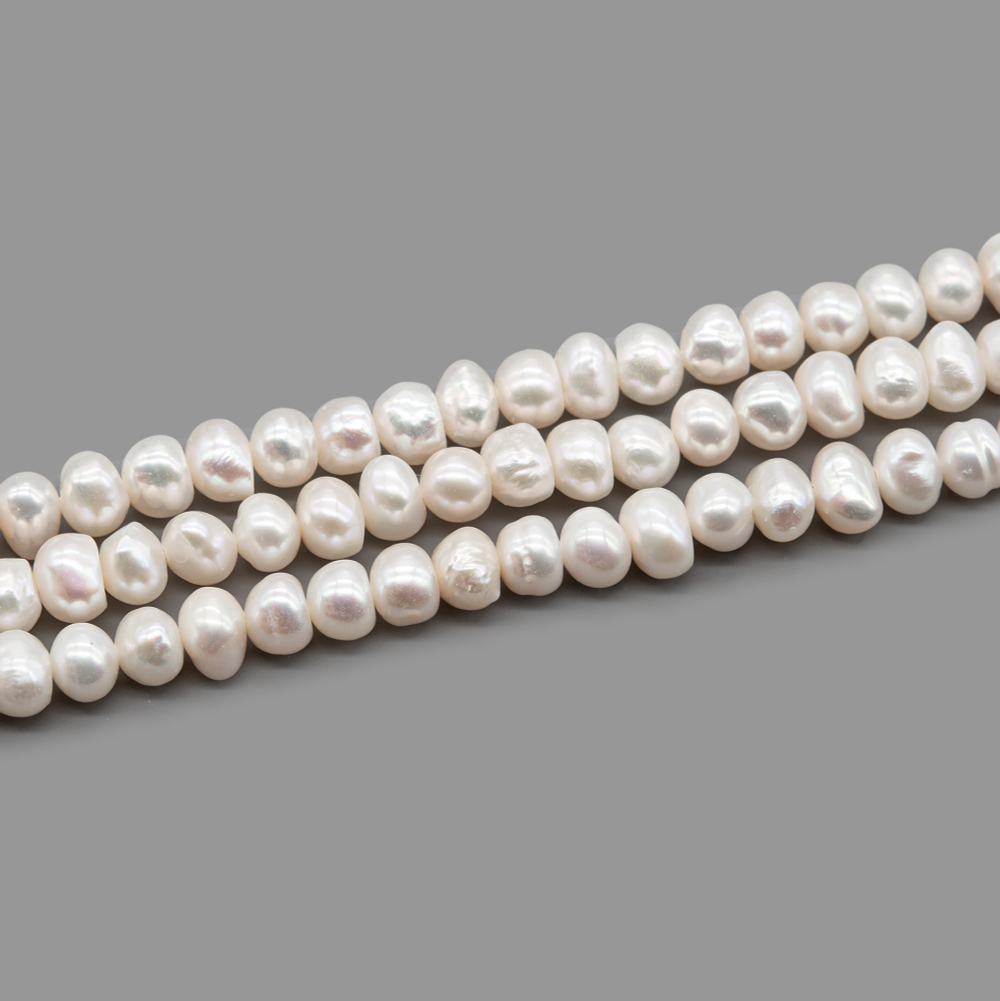 жб-18 Жемчуг нат. "Кукуруза", 5*4мм, айвори, 35-36см