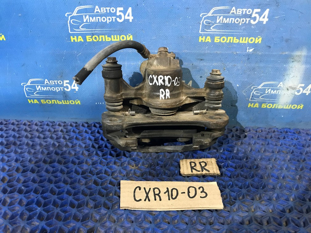 Суппорт тормозной задний правый TOYOTA ESTIMA 1998