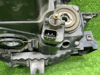 Фара левая Mitsubishi Pajero Sport 2 13-16 ксенон