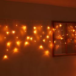 ULD-B12006-195-TTK AMBER IP44 Бахрома светодиодная с эффектом мерцания. 12м. Соединяемая. 195 светодиодов. Янтарный свет. Провод прозрачный. ТМ Uniel