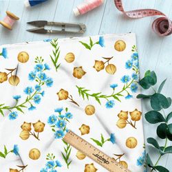 Ткань кулирная гладь фундук и синие цветы на белом фоне