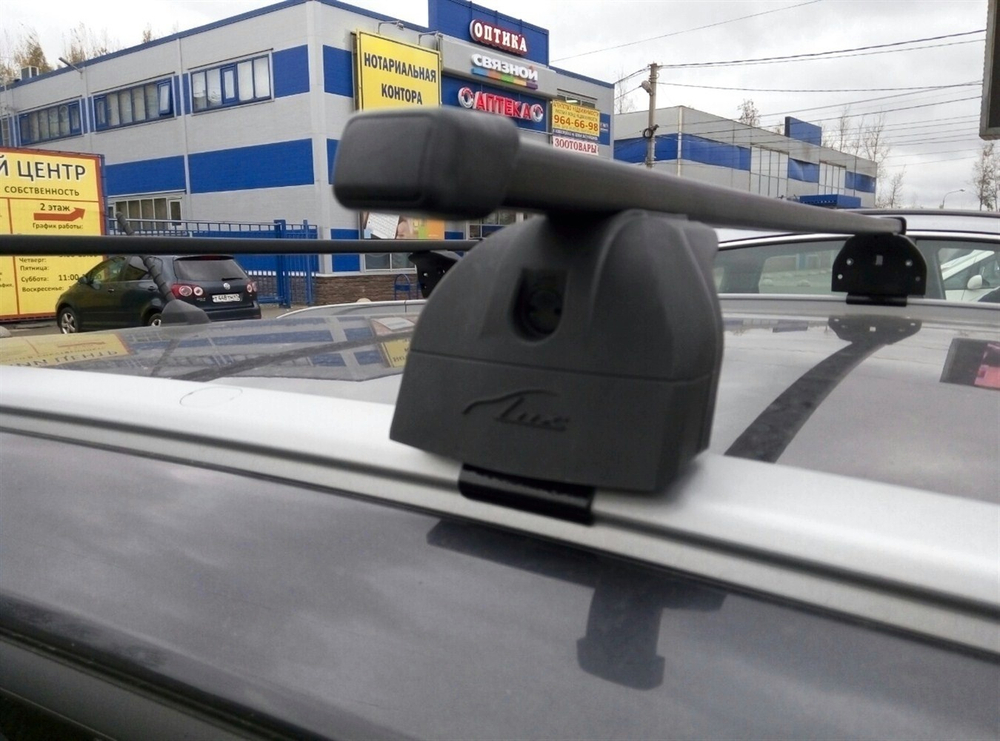 Багажник  "LUX" с дугами 1,2 м прямоугольными в пластике  для Opel Astra J штатные места Sd/Hb 2009-2015 г.в.