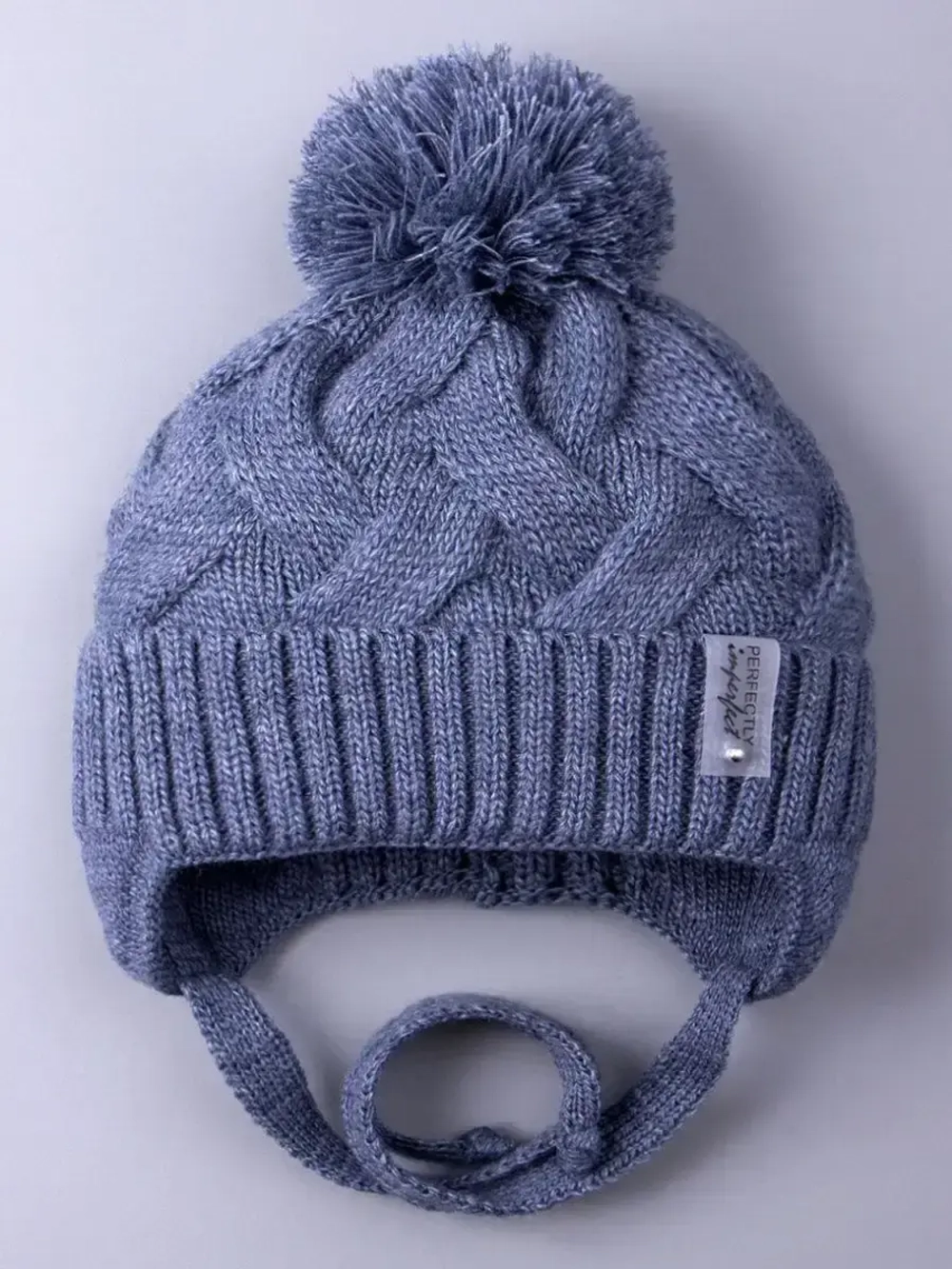 Шапка вязаная демисезонная на завязках для детей