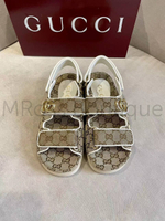 Женские сандалии Gucci GG коричневого цвета с узорами