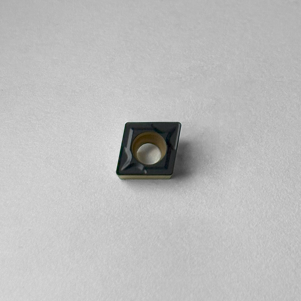 CCMT060204-UM FE1130 Пластина токарная