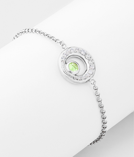 Браслет из серебра со вставками из хризолита и бесцветных фианитов