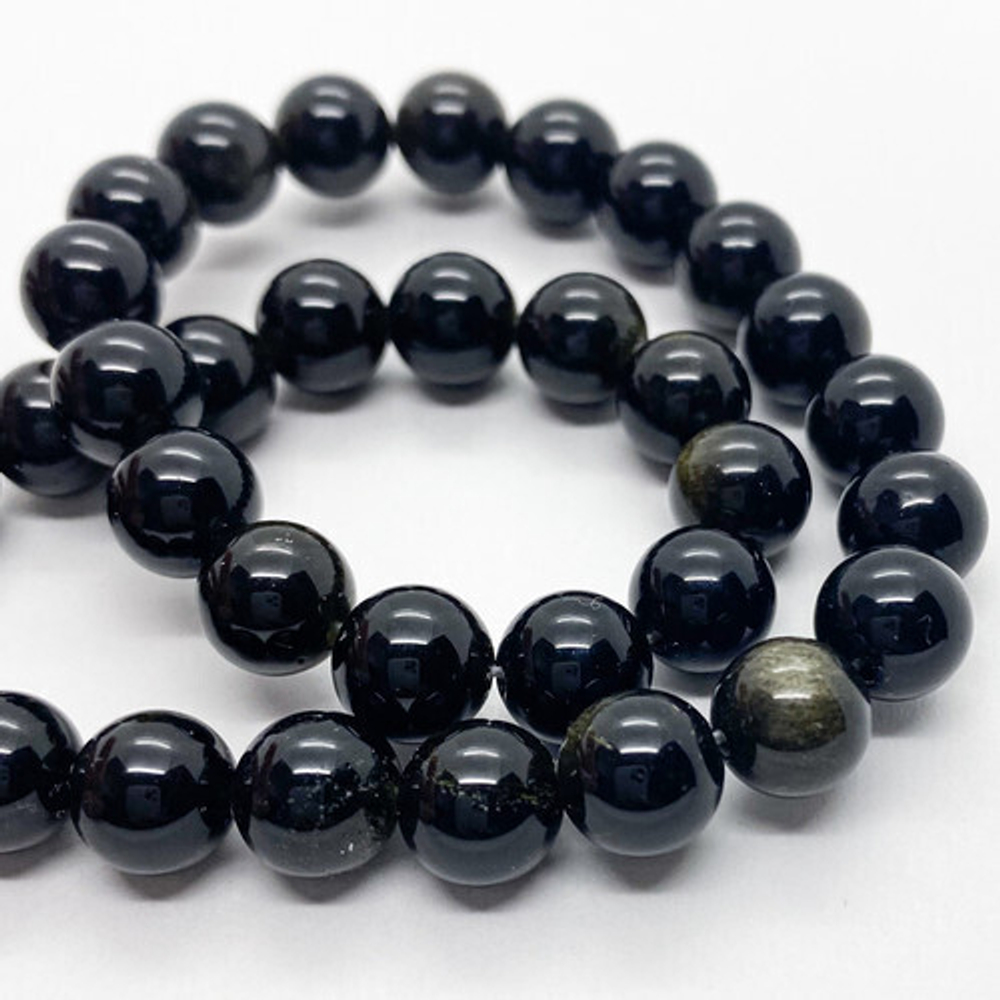 Обсидиан "Золотой" бусины, диаметр 8,2-8,5 мм, цена за 22-23 шт (1/2 нити)