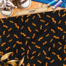 Ткань барби оранжевые летучие мыши на чёрном фоне