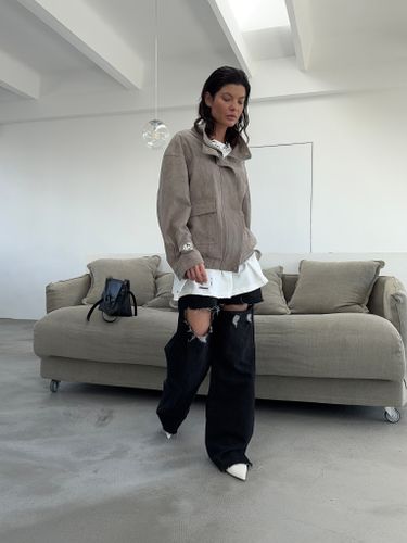 Черные рваные джинсы-трансформеры