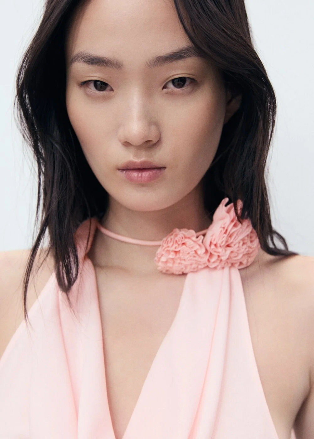 Блузка с драпировкой и цветочным декором