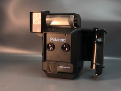 Polaroid Miniportrait 203, обломана крышка батарейного отсека