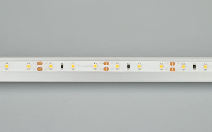 Светодиодная влагозащищенная лента Arlight 4,8W/m 60LED/m 3528SMD теплый белый 50M 024566(2)